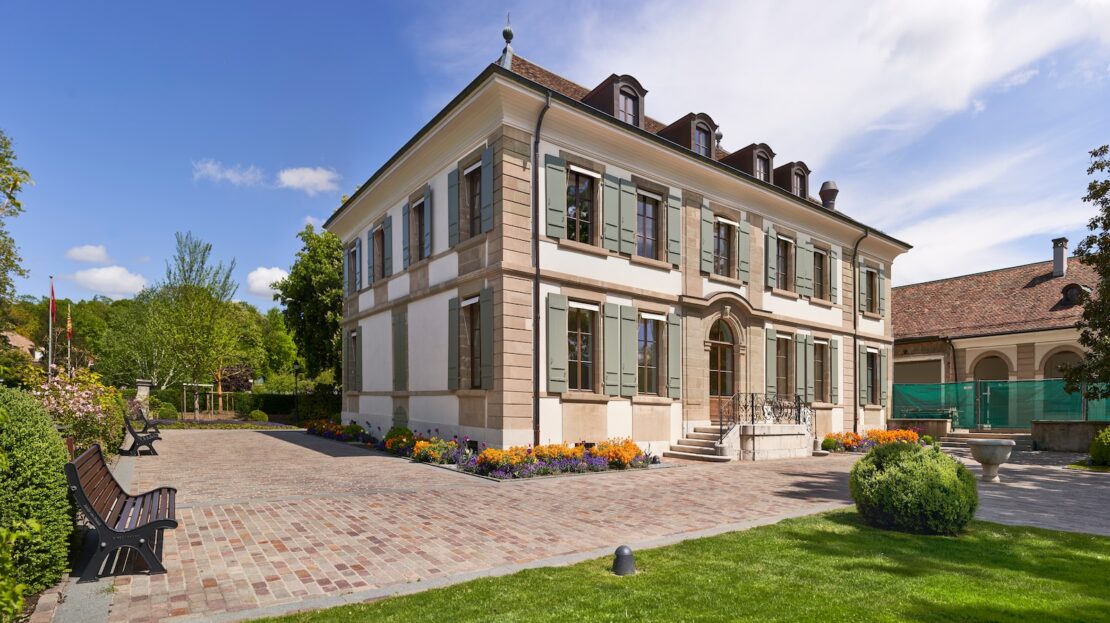 brown and white 2-storey house